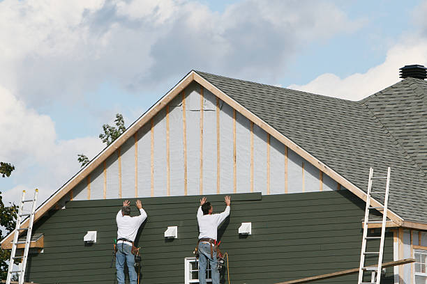 Professional Siding Installation technician working in Union City, IN